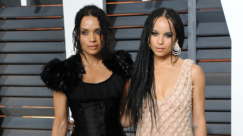 Zoë Kravitz poses with her arm around Lisa Bonet's waist at the 2015 Vanity Fair Oscar Party.