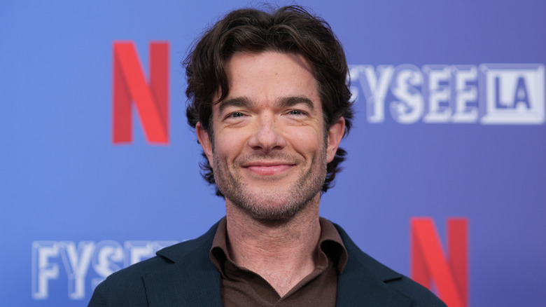 John Mulaney smiling