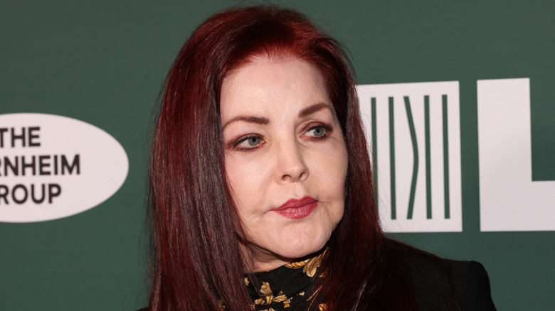Close up of Priscilla Presley looking off to the side.
