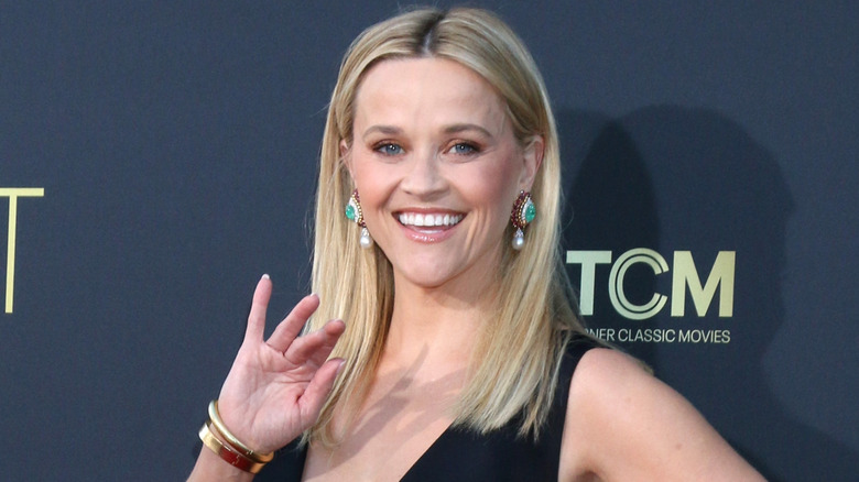 Reese Witherspoon waves