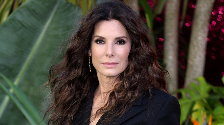 Sandra Bullock with wind-swept waves on the red carpet