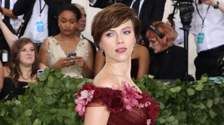 Scarlett Johansson posing with short brown hair