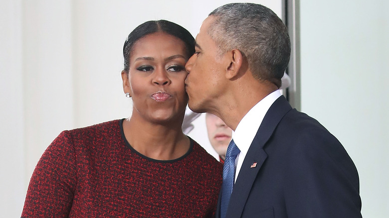 Barack kissing Michelle on the cheek