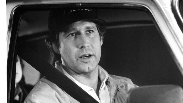 Black and white photo of Chevy Chase on the set of National Lampoon's European Vacation