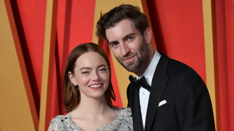 Emma Stone and Dave McCary at the 2024 Vanity Fair Oscar Party.
