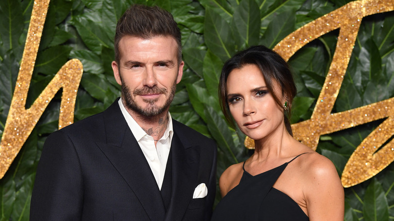 David and Victoria Beckham posing