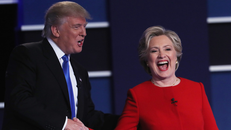 Donald Trump and Hillary Clinton shake hands after the Presidential Debate in 2016