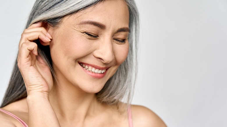 Woman with gray hair smiling