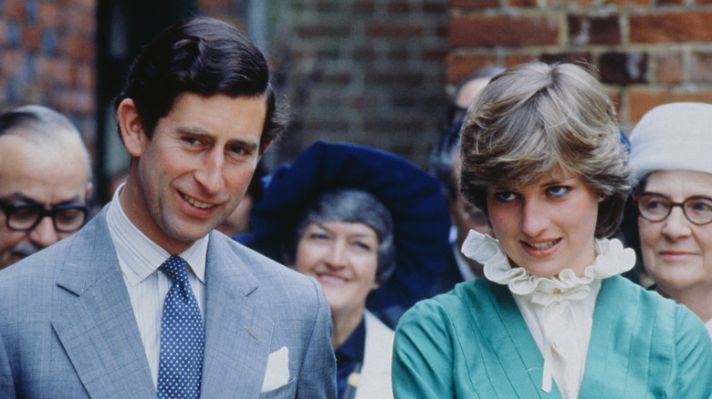 King Charles III and Princess Diana smile 