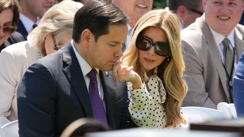 Jeanette Rubio picking something off Marco Rubio's face