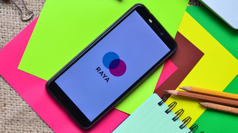 A phone open on the celebrity dating app Raya
