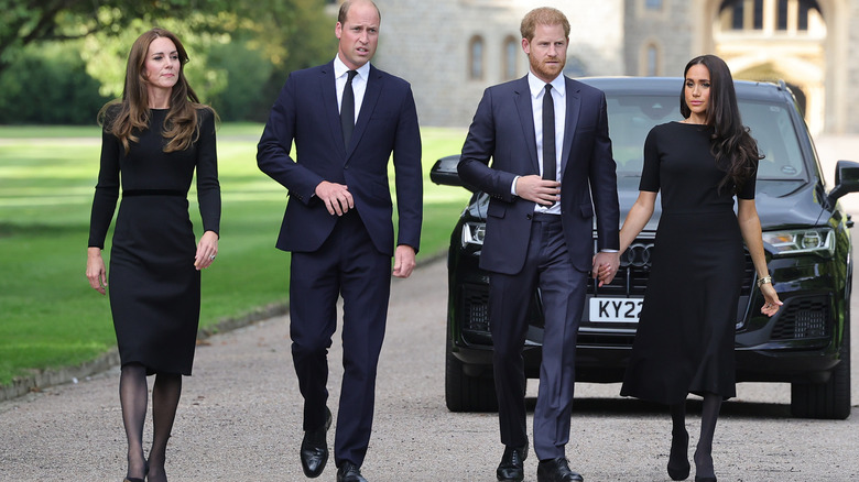 The former Fab Four at Queen Elizabeth II's memorial.
