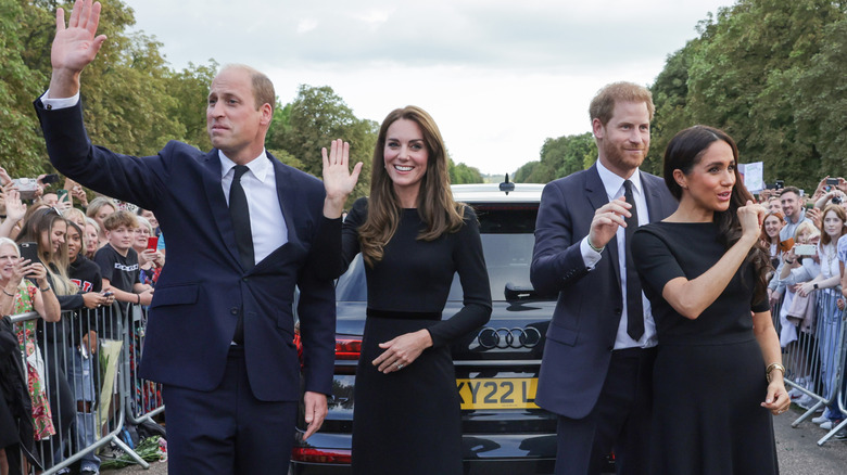 The former Fab Four greeting the British people.