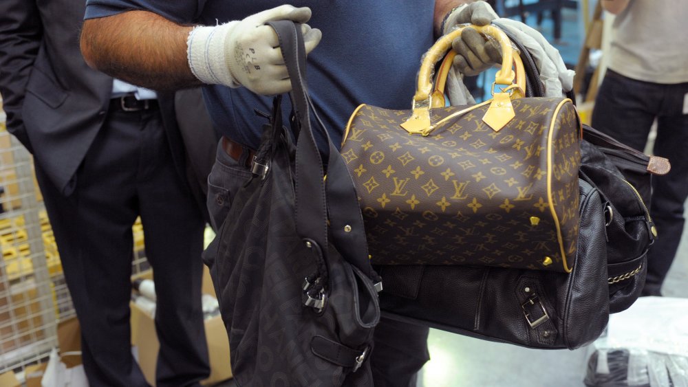 Why do Louis Vuitton bag handles change color? - Quora