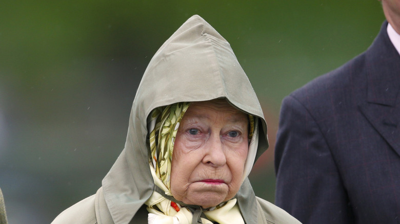 Queen Elizabeth in rain