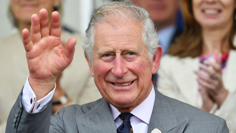 King Charles waving