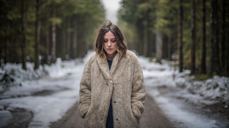 Woman looking sad in winter