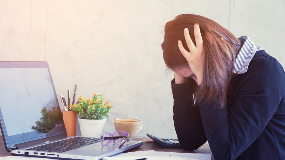 Woman stressed out at work