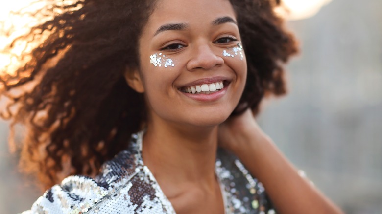 Silver top and sequin makeup