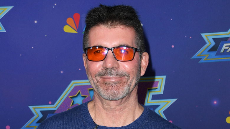 Simon Cowell posing