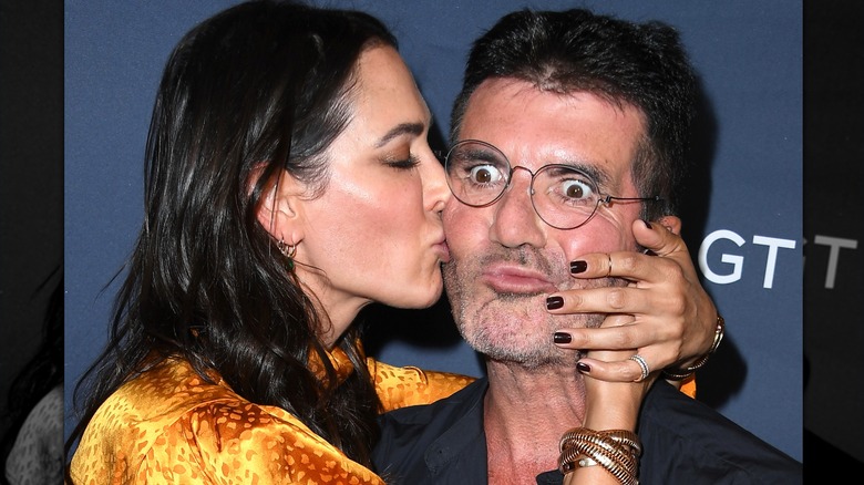 Lauren Silverman kisses Simon Cowell on the cheek at the "America's Got Talent" Season 14 Live Show