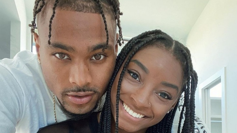 Jonathan Owens and Simone Biles smiling