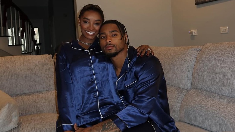 Simone Biles and Jonathan Owens wearing matching pajamas