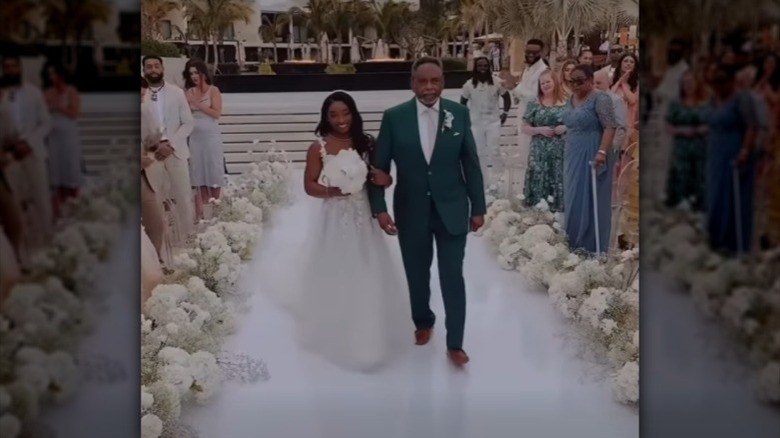 Simone Biles walking down the aisle at her wedding