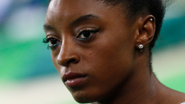 Simone Biles looking serious competing