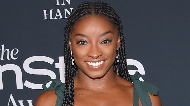 Simone Biles smiling in 2021