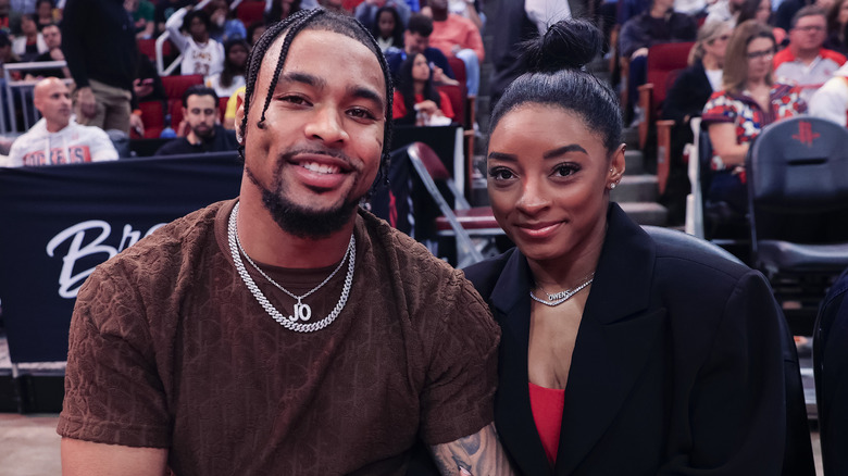 Jonathan Owens and Simone Biles smiling 