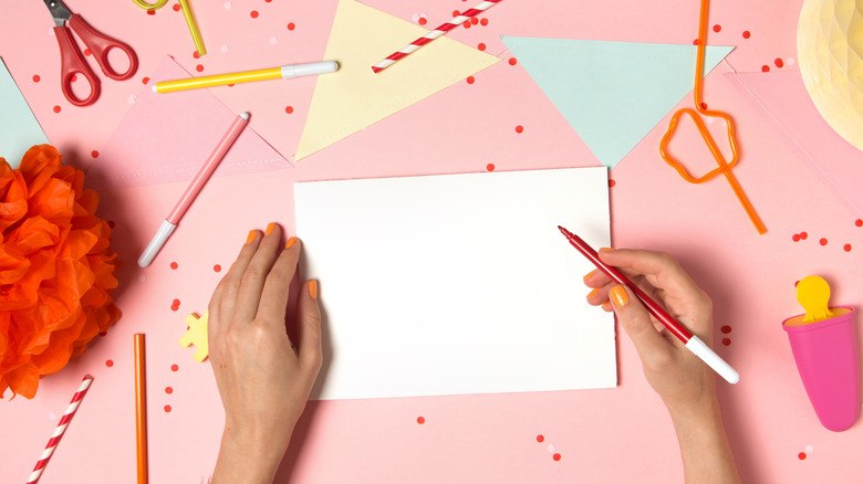 Party planning writing on paper