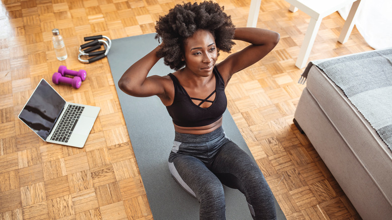 Woman doing sit-ups