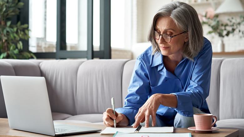 Woman sitting and working