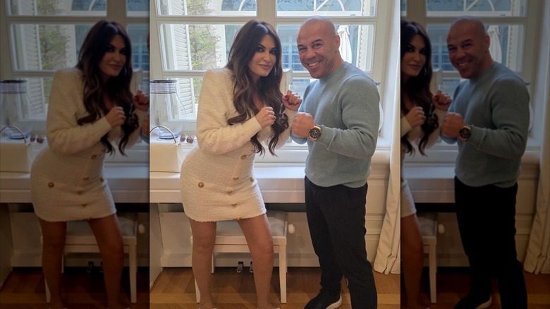 Kimberly Guilfoyle posing with a friend, fists raised