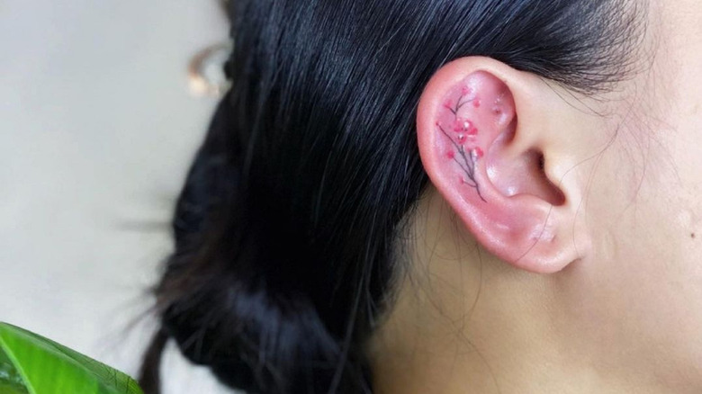 Minimalist Ear Tattoo Trend has People Getting Tiny Tattoos on Ear