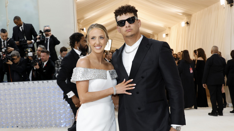 Brittany and Patrick Mahomes posing
