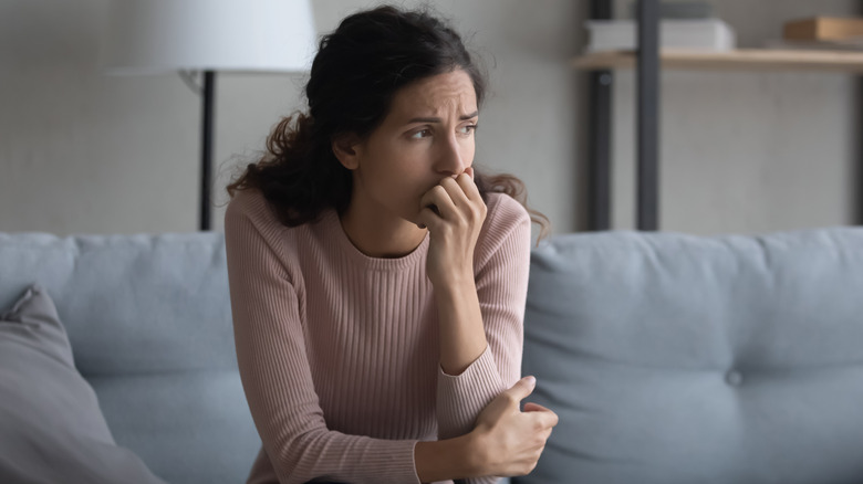 A woman looking stressed