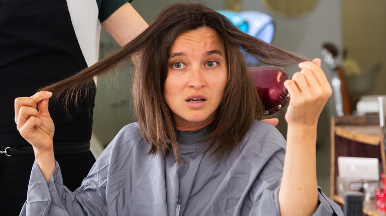 girl upset with hair