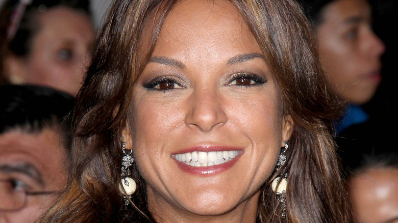 Eva LaRue smiling