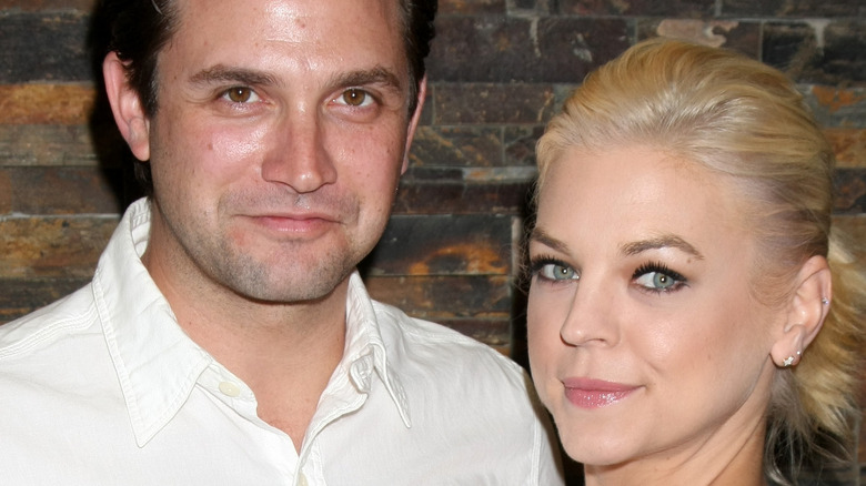 Brandon Barash and Kirsten Storms posing at a fan event