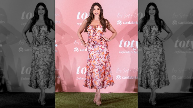 Sofia Vergara at the Four Seasons Hotel in July 2025 in Madrid wearing a pink floral dress, beige open-toed heels