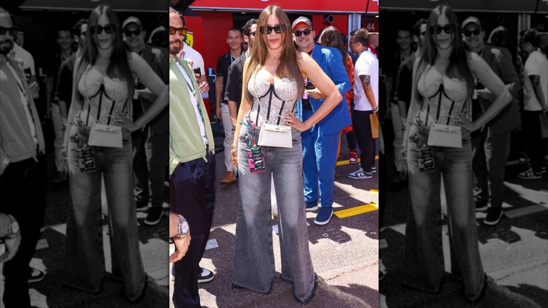 Sofía Vergara at the F1 Grand Prix Of Monaco on May 25, 2025 in Monte Carlo wearing a silver bustier top and wide-legged blue jeans with sunglasses