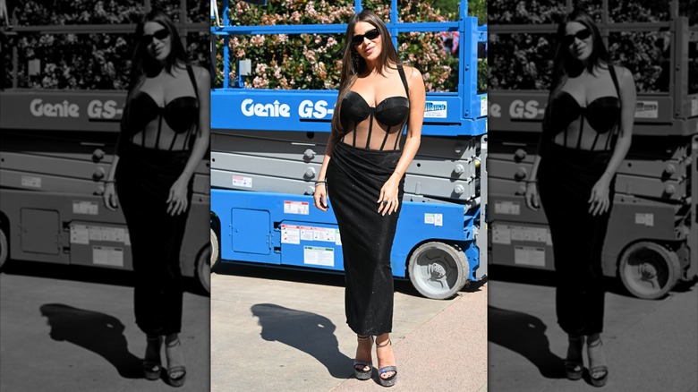 Sofía Vergara at America's Got Talent in 2026 in Pasadena wearing a black sleeveless dress with sheer illusion panels, silver heels, and black sunglasses