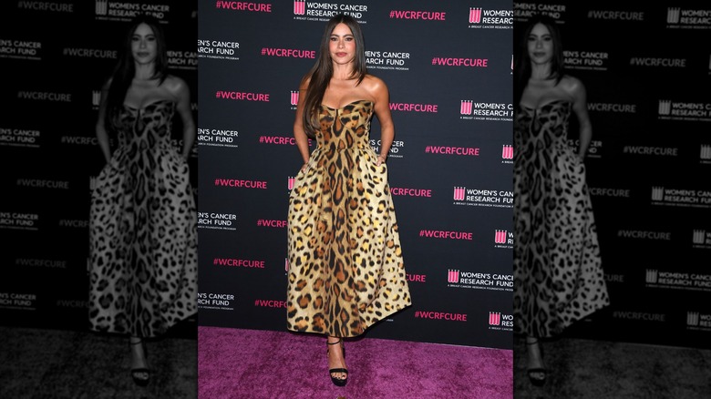 Sofía Vergara at a benefit in 2026 wearing a leopard print sleeveless dress with black open-toed heels