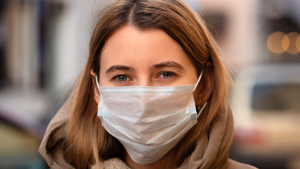 Woman wearing a mask