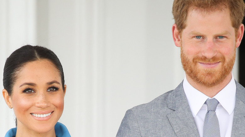 prince harry and meghan markle smiling