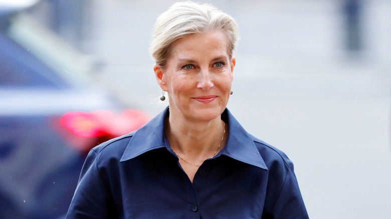 Sophie, Duchess of Edinburgh, walking outdoors in a navy blue coat