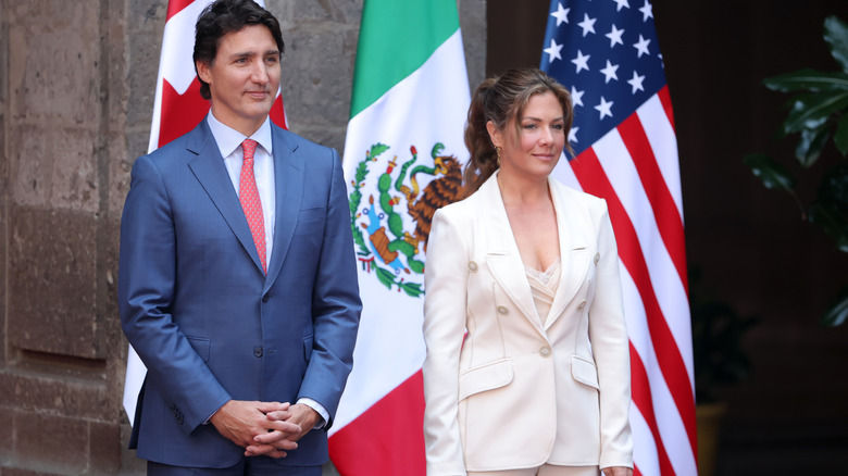 Justin and Sophie Trudeau standing next to each other at an event