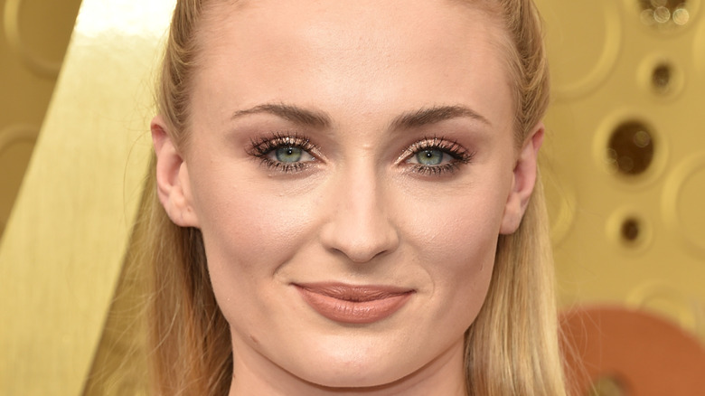 Sophie Turner poses on the red carpet